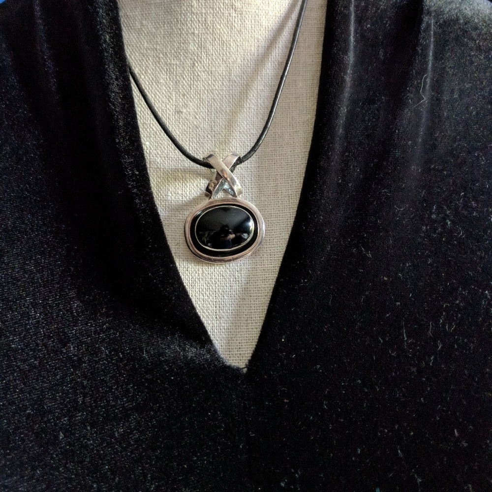 Silver and onyx handmade charm with large bail.